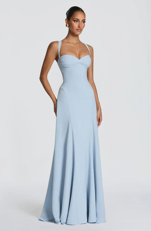 Close-up of light blue wedding guest maxi dress showing sweetheart neckline and bodice