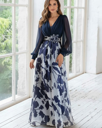 Navy v-neck maxi dress with blue and white floral print and puff sleeves
