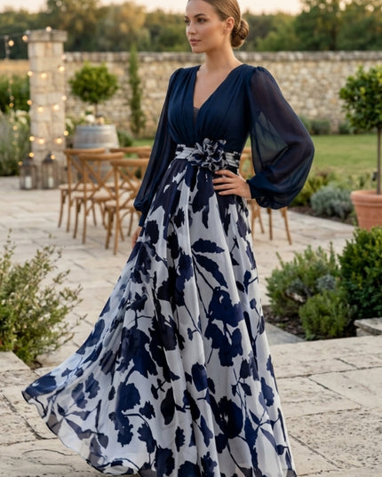 Navy floral maxi dress with long sleeves worn outdoors in garden setting