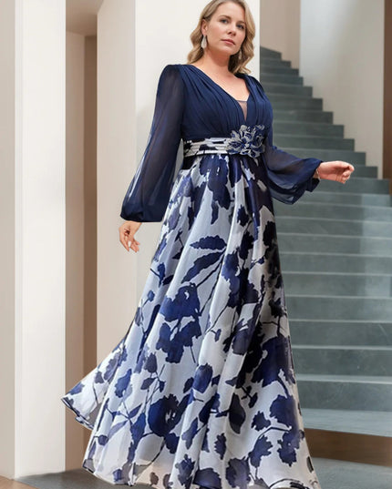 Navy floral v-neck maxi dress with balloon sleeves and decorative belt detail