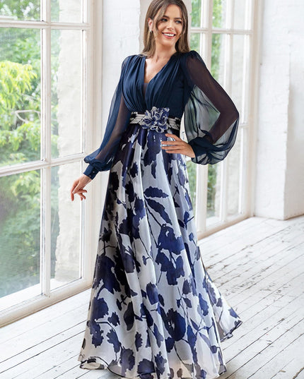 Navy floral v-neck maxi dress with long sheer sleeves and beaded waist
