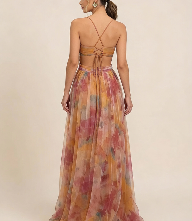 Back view of watercolor floral maxi dress showing lace-up strappy back detail