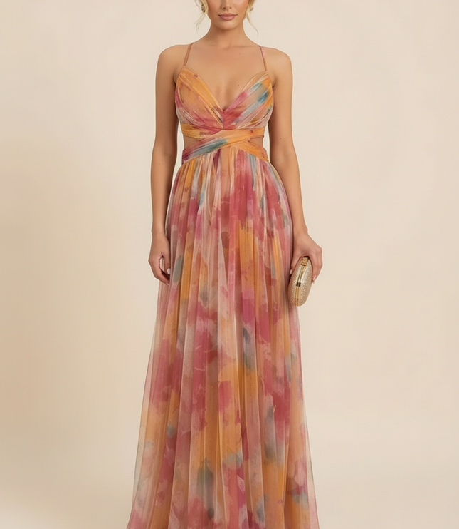Watercolor floral maxi dress with wrap bodice and pleated skirt in pink, orange, and blue