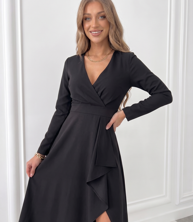 Black midi wedding guest dress with wrap front, long sleeves and elegant draped slit skirt