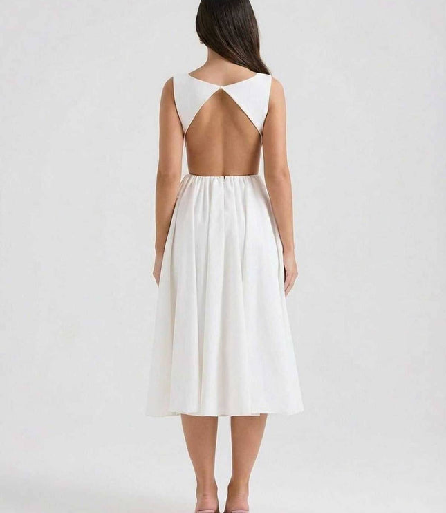 Back view of white midi dress with open back cutout and sleeveless bodice