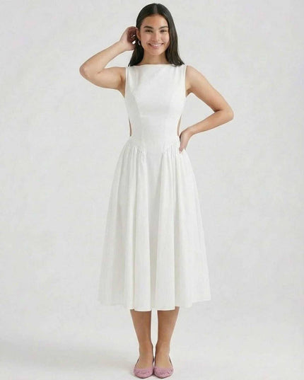 Front view of white midi dress with side cutouts, boat neck, and flared skirt